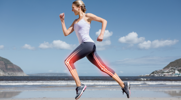 A female athlete running on the beach